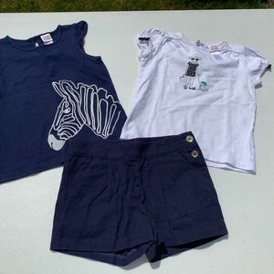 Zebra top, navy shorts, white designed tank